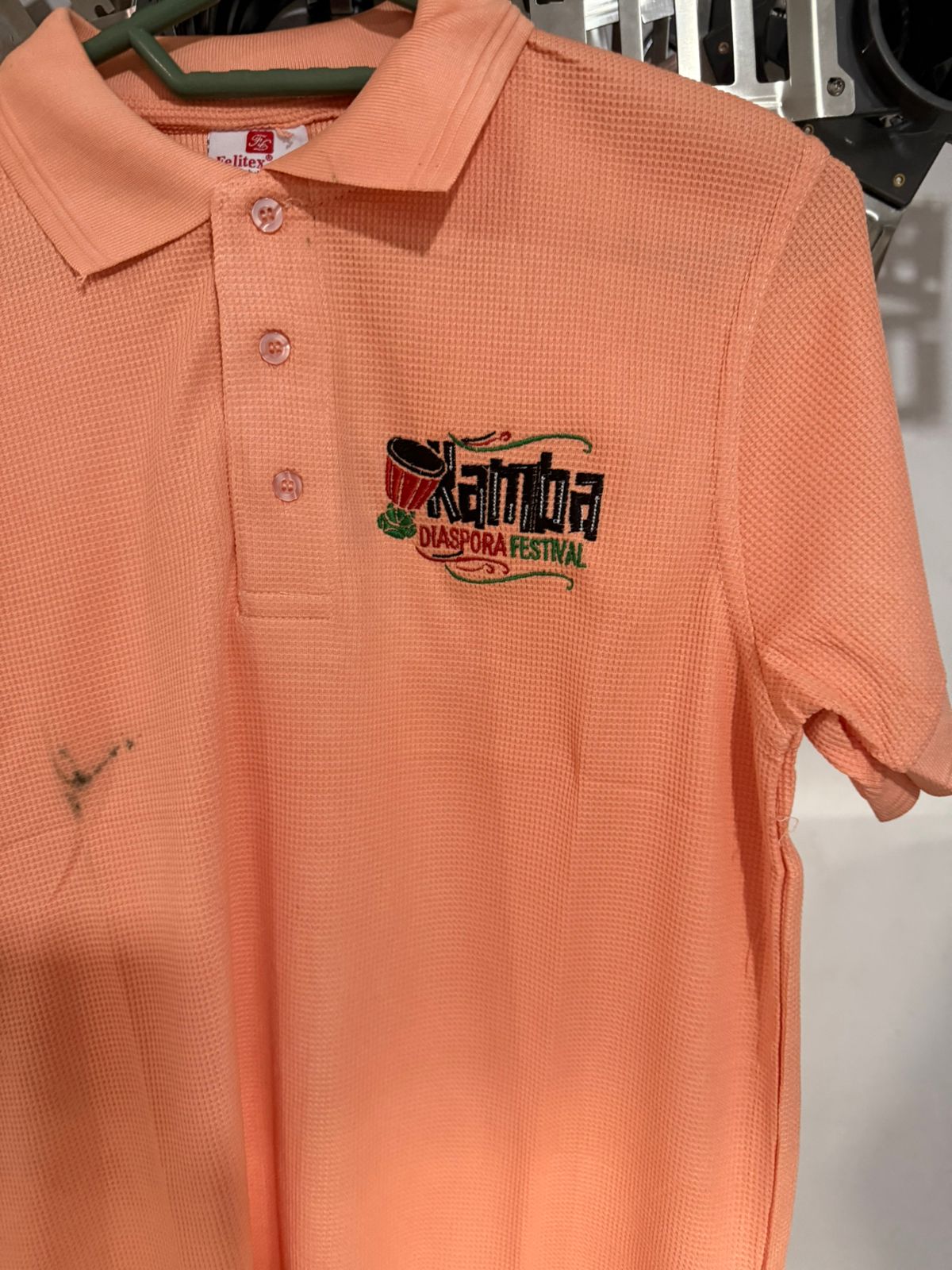 Peach polo shirt